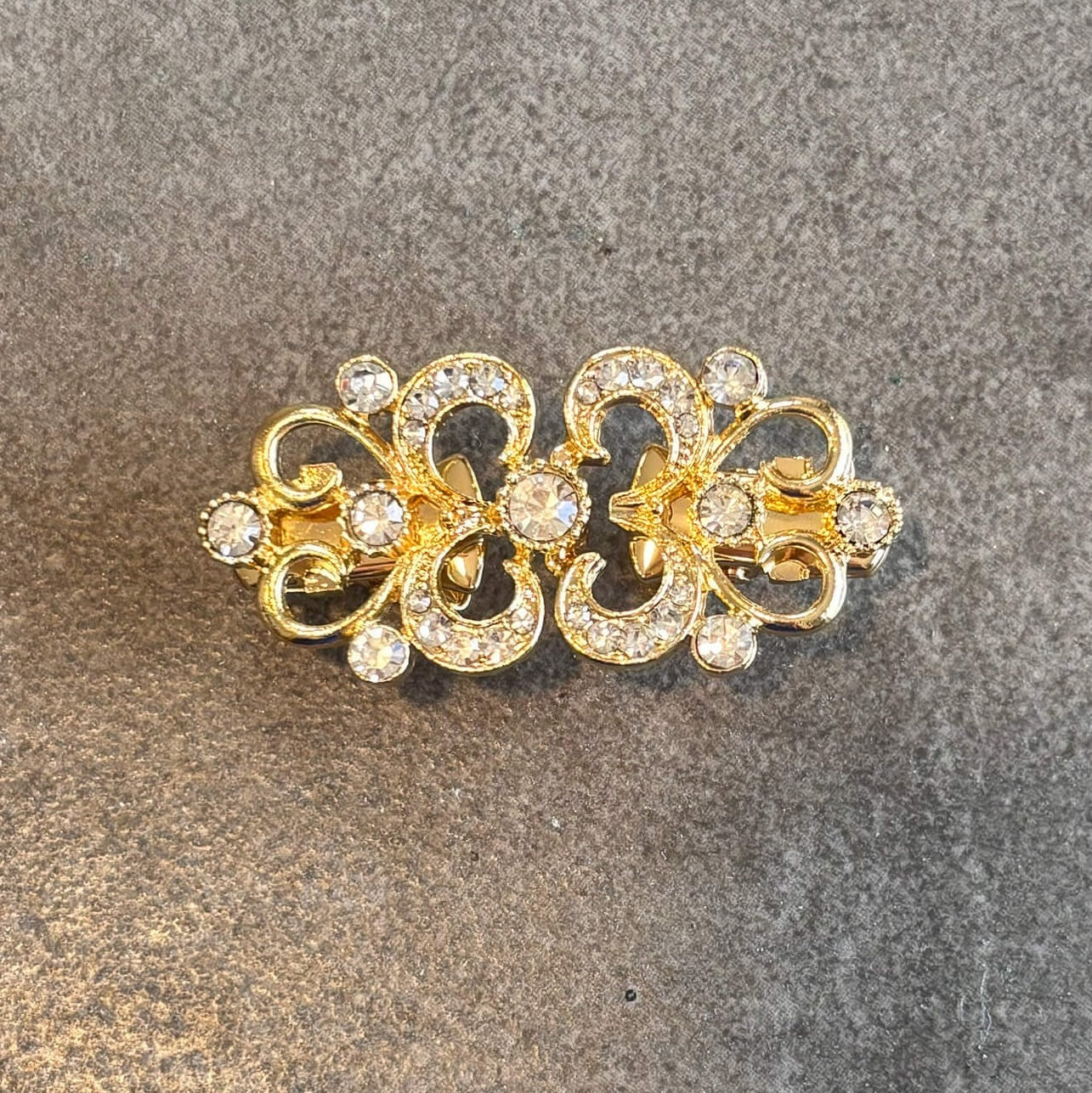 gold clasp cinch clothing accessory