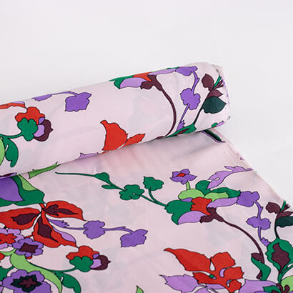 colourful retro floral on blush pink fabric