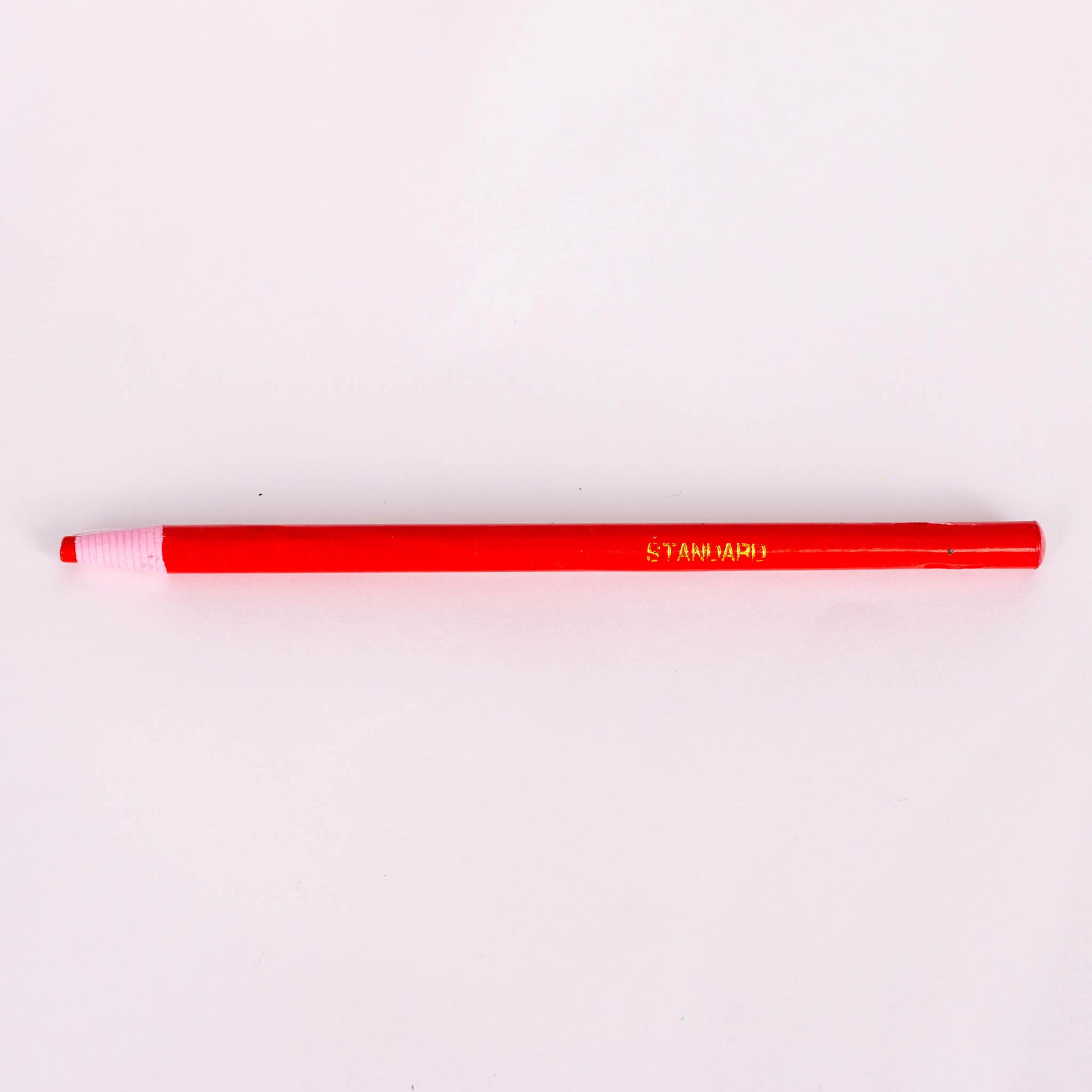 red tailors sewing chalk pencil