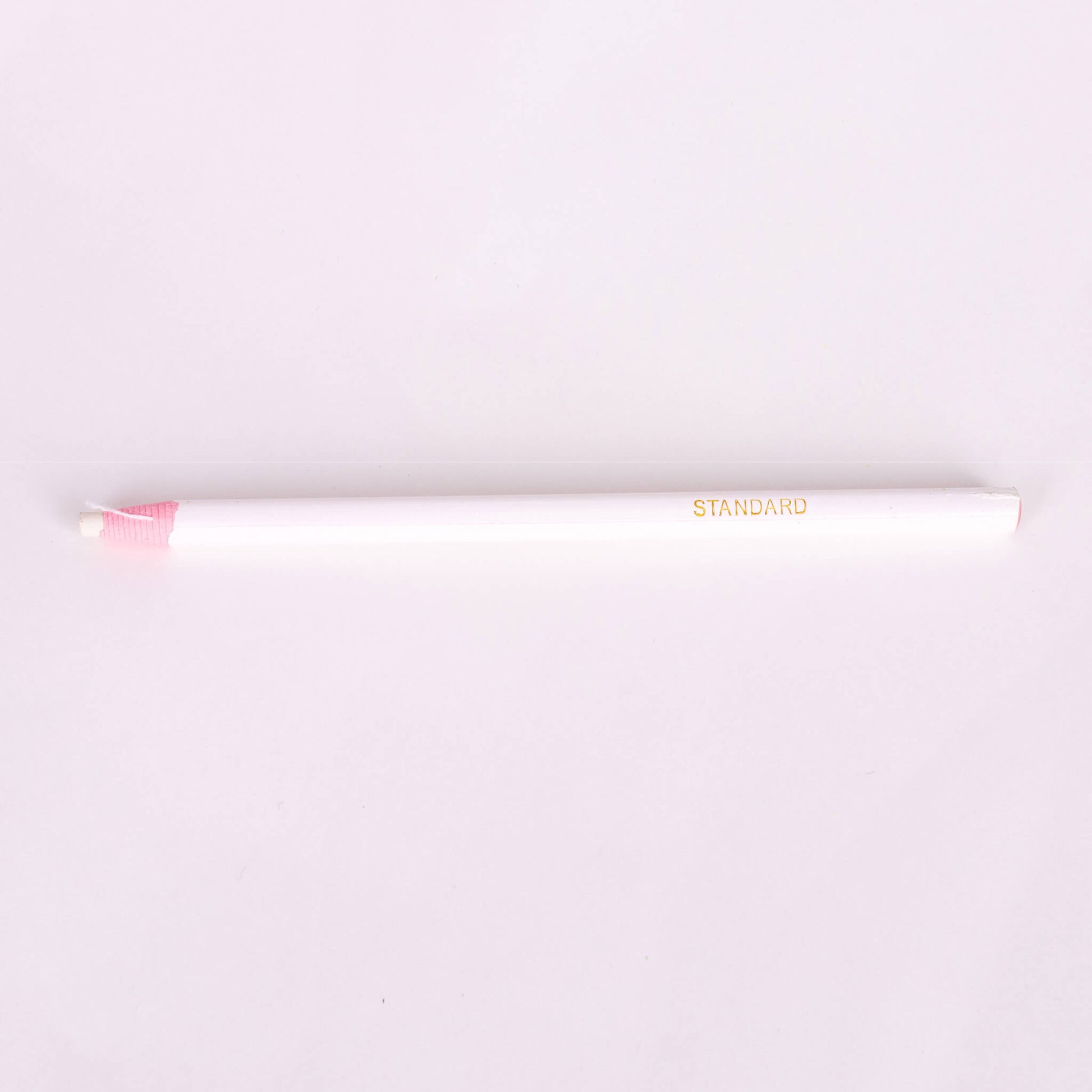 white tailors sewing chalk pencil